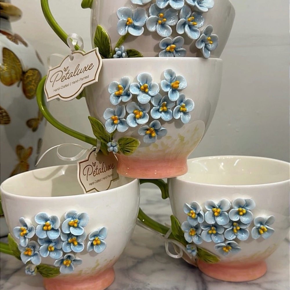 4 Hand-Painted Floral Teacup Set with Blue Blossom Detail